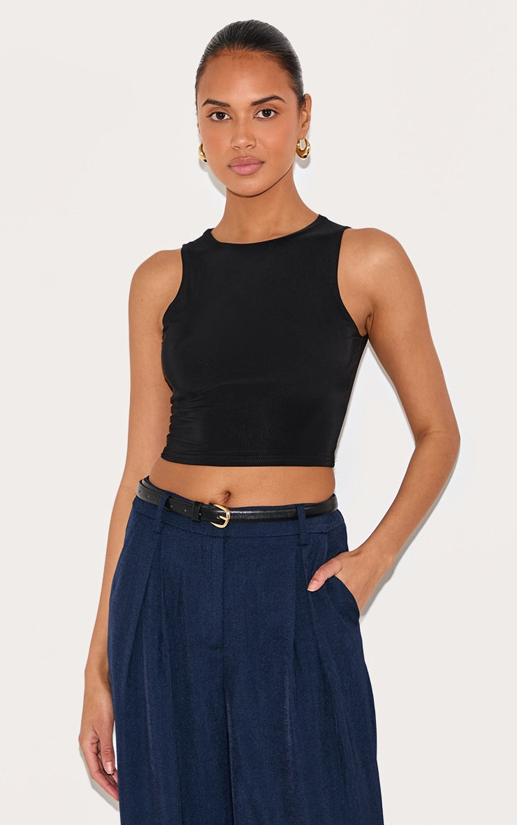 https://cdn-img.prettylittlething.com/c/d/0/e/cd0ea55bb13af07e1f1224cb223b7cf088edc757_CNG0442_1_black_slinky_racer_crop_top.jpg